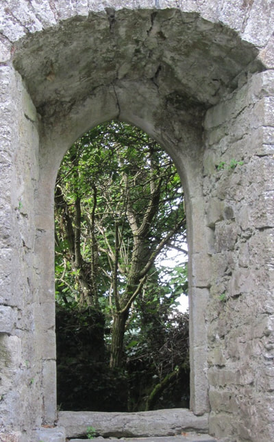Through the arched window in the tower at 3 Castles.